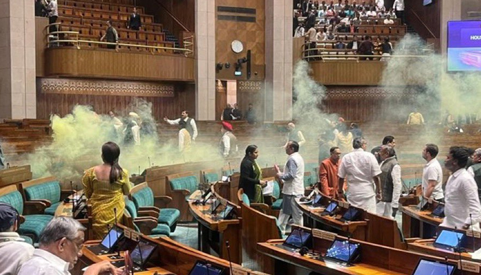 BIG BREAKING: Serious lapse in security of Parliament, two people jumped into Lok Sabha hall from the audience gallery.