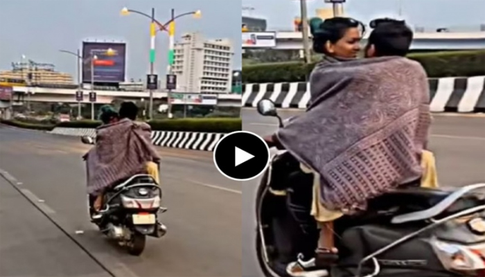 Couple's video goes viral, the couple is seen enjoying the cold and romancing on the scooter... VIDEO Viral