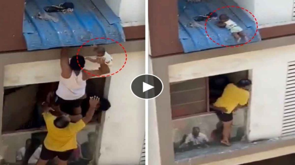 child hanging on plastic sheet watch shocking viral video of rescue