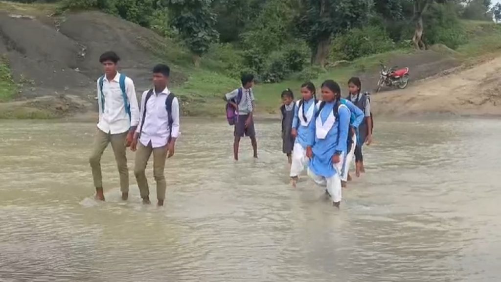 Children Crossing River To School